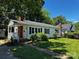 Charming single-story home with a well-maintained lawn and inviting front porch at 1119 Sanders St, Rock Hill, SC 29732