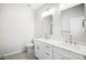 This bathroom features double sinks, modern fixtures and lighting, and tile floors at 112 Bickett Ave, Gastonia, NC 28052
