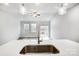 Bright open living space with modern hardwood floors, recessed lighting, and kitchen view at 112 Bickett Ave, Gastonia, NC 28052