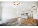 Bright open living space with modern hardwood floors, recessed lighting, and vaulted ceilings at 112 Bickett Ave, Gastonia, NC 28052