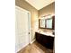 Well-lit bathroom with sleek vanity, elegant fixtures, and tiled flooring for a clean and modern design at 1140 Fern Hill Rd, Mooresville, NC 28117