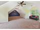Bonus room with carpet, tv, ceiling fan, and natural light from windows at 1140 Fern Hill Rd, Mooresville, NC 28117