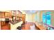 A well-appointed kitchen featuring wood cabinets, granite countertops, and stainless steel appliances, perfect for culinary enthusiasts at 1140 Fern Hill Rd, Mooresville, NC 28117