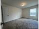 Inviting bedroom with a window that fills the room with light at 11505 Sweetbriar Ridge Dr, Charlotte, NC 28269