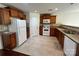 Well-lit kitchen featuring wooden cabinets, modern appliances, and durable countertops at 11505 Sweetbriar Ridge Dr, Charlotte, NC 28269