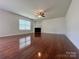 Inviting living room with hardwood floors, a fireplace, and a neutral color palette at 11505 Sweetbriar Ridge Dr, Charlotte, NC 28269