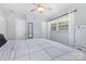 Well-lit bedroom with neutral walls and a large bed, perfect for relaxation at 1218 E Woodlawn Rd, Charlotte, NC 28209