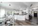 Bright kitchen with stainless steel appliances, granite countertops, and ample counter space at 126 Strand Rd, New London, NC 28127