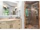 Bathroom featuring a walk-in shower, marble countertops, decorative fixtures, and modern design elements at 12835 Ninebark Trl, Charlotte, NC 28278