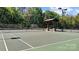 Well-maintained tennis court with shelter for players, offering a premium recreational amenity at 12835 Ninebark Trl, Charlotte, NC 28278