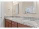Dual sink bathroom with granite counters and a modern design at 1400 Delaney Dr, Matthews, NC 28104