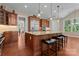 Expansive kitchen with center island, stainless steel appliances and adjacent breakfast bar for convenience at 1400 Delaney Dr, Matthews, NC 28104