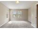 Bedroom with carpet, with lots of natural light streaming through the windows creating a bright and inviting space at 14010 Pinyon Pine Ln, Charlotte, NC 28215