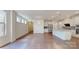 Bright and airy living room showcases an open floor plan, hardwood floors, and arched doorway at 14506 Knowledge Cir, Charlotte, NC 28277