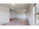 Bright living room with hardwood floors, white walls, recessed lights, and crown molding at 14506 Knowledge Cir, Charlotte, NC 28277