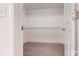 Walk-in closet with wire shelving and hardwood flooring at 14506 Knowledge Cir, Charlotte, NC 28277