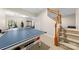 Finished basement with a ping pong table, stairs, and access to a workout area at 146 Comata Rd, Mooresville, NC 28117