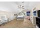 Bright bedroom with a ceiling fan, neutral colored walls, carpet, and modern furniture at 146 Comata Rd, Mooresville, NC 28117