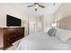 Comfortable bedroom featuring a dresser, ceiling fan, and natural lighting at 146 Comata Rd, Mooresville, NC 28117