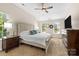 Cozy bedroom with neutral tones, plush carpet, and plenty of natural light at 146 Comata Rd, Mooresville, NC 28117