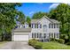 Charming two-story home with attached garage and well-maintained front yard at 146 Comata Rd, Mooresville, NC 28117