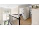 Upstairs hallway with a view of the front door and a bedroom at 146 Comata Rd, Mooresville, NC 28117