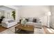 Comfortable living room with neutral tones, hardwood floors, and ample seating at 146 Comata Rd, Mooresville, NC 28117