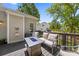 Relaxing outdoor patio features comfortable seating and a modern fire pit table at 146 Comata Rd, Mooresville, NC 28117