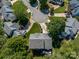 Aerial view of a home with a deck in a quiet suburban neighborhood with a cul-de-sac at 146 Comata Rd, Mooresville, NC 28117