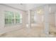 Spacious bedroom with neutral colors, carpet floor and lots of natural light from large windows at 15037 Taylor Ridge Ln # 25, Charlotte, NC 28273