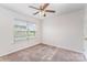 Bright, airy bedroom featuring neutral walls, carpet and a window offering lots of natural light at 15037 Taylor Ridge Ln # 25, Charlotte, NC 28273