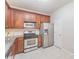 Updated kitchen with stainless steel appliances, granite countertops, and ample cabinet space at 15037 Taylor Ridge Ln # 25, Charlotte, NC 28273