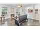 Inviting living room boasts a fireplace and transitions to a well-lit kitchen with barstool seating at 15037 Taylor Ridge Ln # 25, Charlotte, NC 28273
