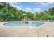 Community pool with colorful splash pad features and water slide, great for  at 15037 Taylor Ridge Ln # 25, Charlotte, NC 28273