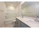Full bathroom with double sinks, a shower and tub combination, and a large vanity mirror at 1505 Harper Landing Blvd, Stanley, NC 28164