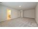 Spacious bedroom featuring neutral walls and carpet with an ensuite bathroom and walk-in closet at 1505 Harper Landing Blvd, Stanley, NC 28164