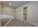 Walk-in closet with wire shelving provides ample storage space, and access to laundry room at 1505 Harper Landing Blvd, Stanley, NC 28164