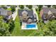 An aerial view of the home's backyard, highlighting the pool and outdoor seating area at 16109 Reynolds Dr, Indian Land, SC 29707