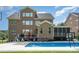 The backyard boasts a pool, patio, and a well-maintained brick home at 16109 Reynolds Dr, Indian Land, SC 29707