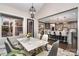 Elegant dining space with marble table, stylish chairs, and modern lighting at 16109 Reynolds Dr, Indian Land, SC 29707