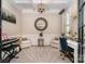 A well-lit office featuring neutral colors, a stylish desk and chair, and modern decor at 16109 Reynolds Dr, Indian Land, SC 29707