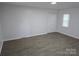Bedroom with light walls, wood flooring and a double door closet at 1900 Walkup Ave # 1, Monroe, NC 28110