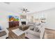 Cozy living room with plush sofas, a fireplace, and a large TV screen on the console at 191 Tackle Box Dr, Troutman, NC 28166