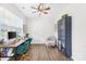 Bright and spacious office with a modern desk, chair, and decorative built-in shelving at 191 Tackle Box Dr, Troutman, NC 28166