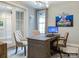 Stylish home office featuring classic furniture, a large desk, and neutral tones that offer an airy workspace at 19329 Youngblood W Rd # 4, Charlotte, NC 28278