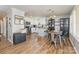 Bright dining room featuring hard wood floors and an open concept layout at 201 Easy St, Concord, NC 28027
