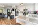 Bright kitchen with white cabinetry, granite countertops, stainless steel appliances, and an open layout at 201 Easy St, Concord, NC 28027