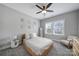 Stylish bedroom featuring neutral decor, a large window, and a rattan bed frame at 2025 Masons Bend Dr, Fort Mill, SC 29708