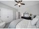 Comfortable bedroom featuring a closet, a ceiling fan, and neutral decor at 2025 Masons Bend Dr, Fort Mill, SC 29708