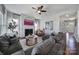 Bright living room featuring a fireplace, a comfy sectional sofa, and tasteful decor at 2025 Masons Bend Dr, Fort Mill, SC 29708